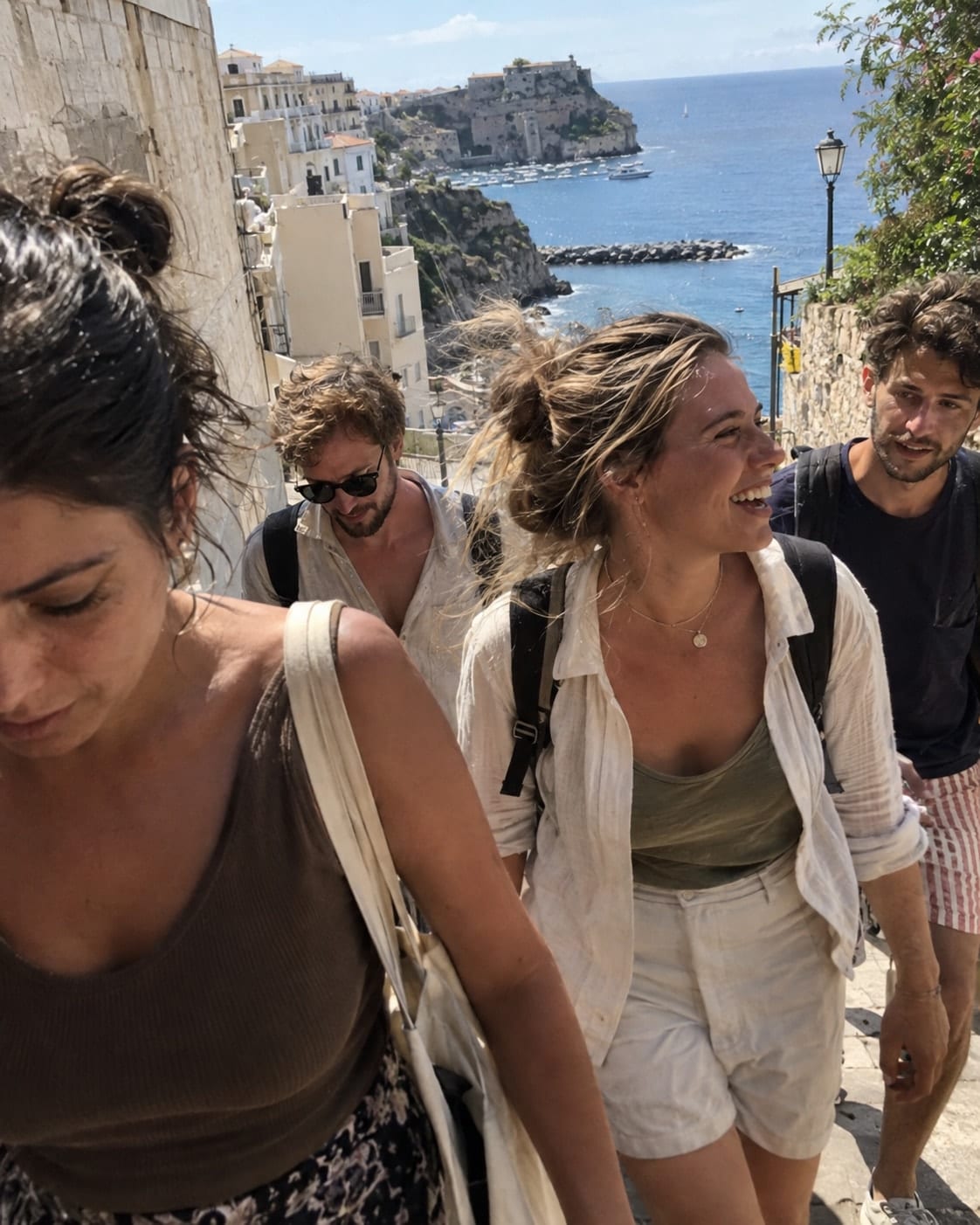 Friends walking together on a coastal trip
