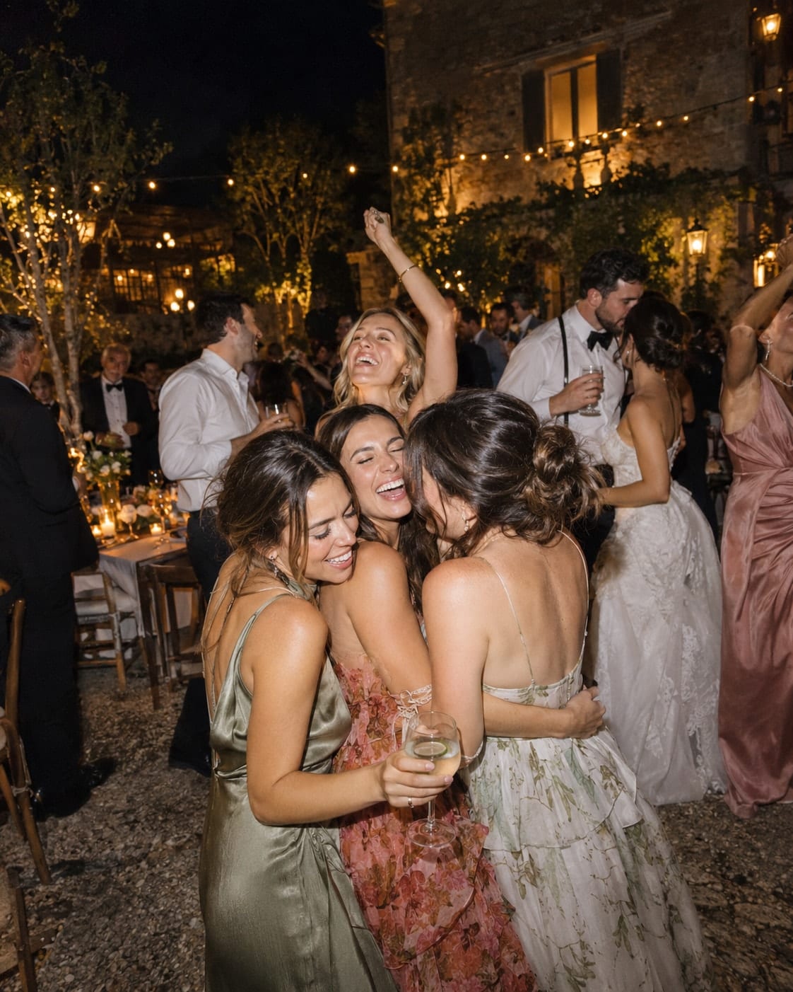 Guests dancing together at a wedding reception