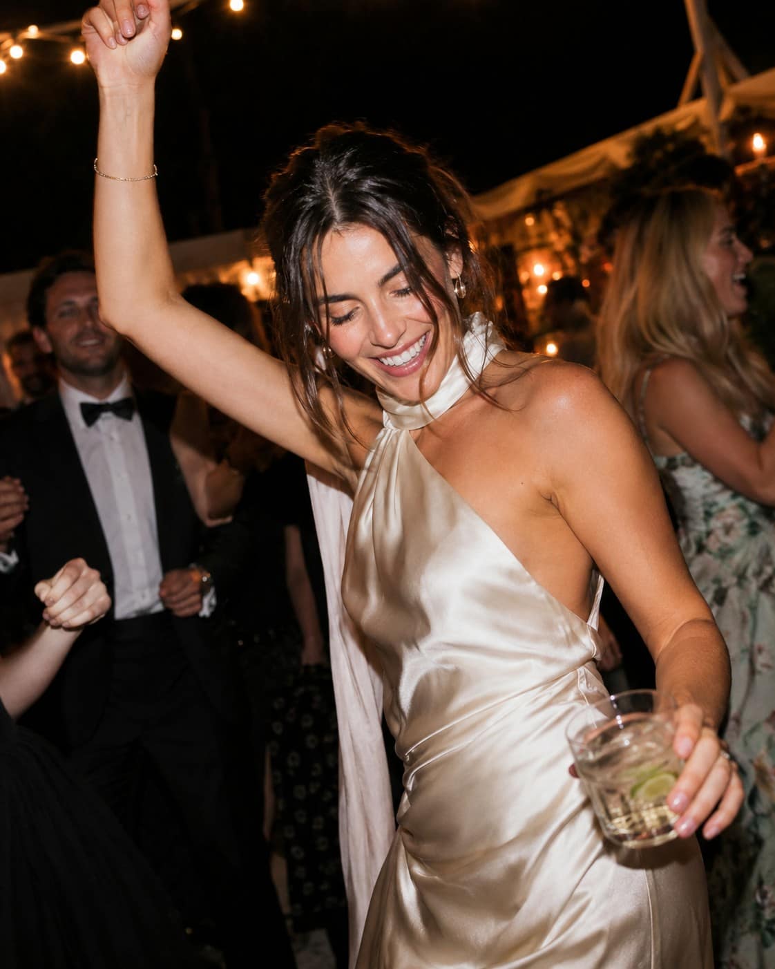 Guest dancing at an evening celebration
